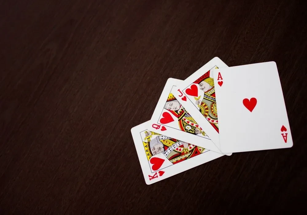 Four heart cards in focus