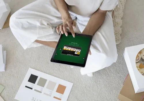 A tablet showing an open game of solitaire in 247 Solitaire