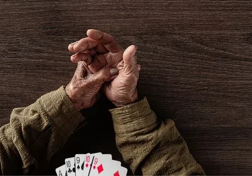 Hands with arthritis in focus